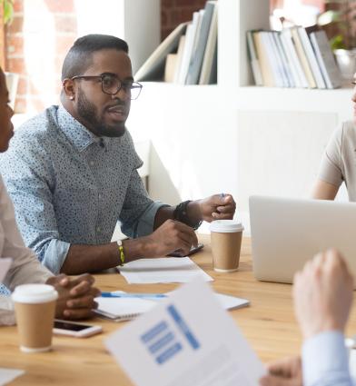 Diverse group meeting around the table