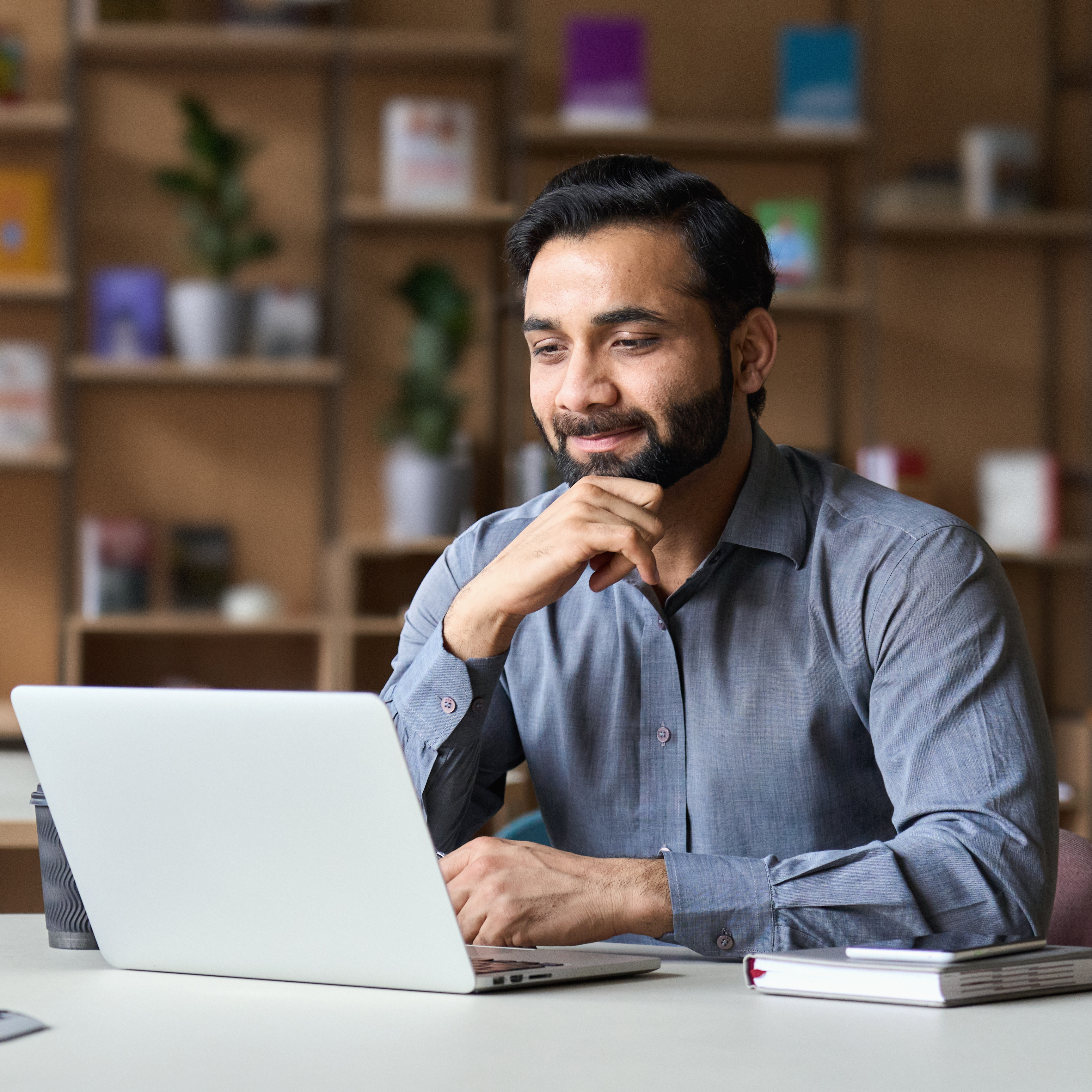 Asian man at laptop